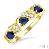 4x3 MM Pear Cut Sapphire and 1/10 Ctw Lattice Round Cut Diamond Precious Band in 14K Yellow Gold