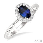 6x4 MM Oval Shape Sapphire and 1/6 Ctw Round Cut Diamond Halo Precious Ring in 14K White Gold
