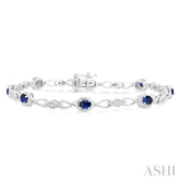 1/20 Ctw Oval Cut 4X3MM Sapphire and Round Cut Diamond Precious Fashion Bracelet in 10K White Gold
