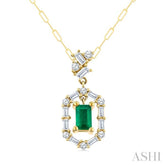 5x3 MM Emerald Cut and 1/3 Ctw Baguette & Round Cut Diamond Precious Fashion Pendant With Chain in 14K Yellow Gold