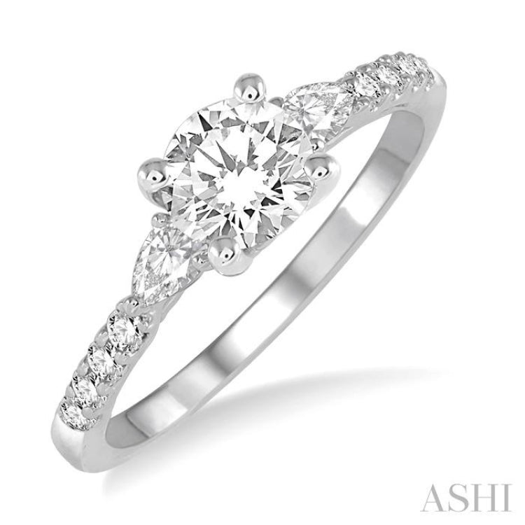 7/8 Ctw Pear and Round Cut Diamond Engagement Ring With 1/2 Ct Round Cut Center Stone in 14K White Gold