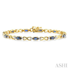 5x3 MM Oval Cut Sapphire and 1/10 Ctw Round Cut Diamond Bracelet in 10K Yellow Gold
