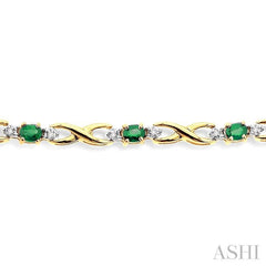 4x3 MM Oval Cut Emerald and 1/10 Ctw Round Cut Diamond Bracelet in 10K Yellow Gold