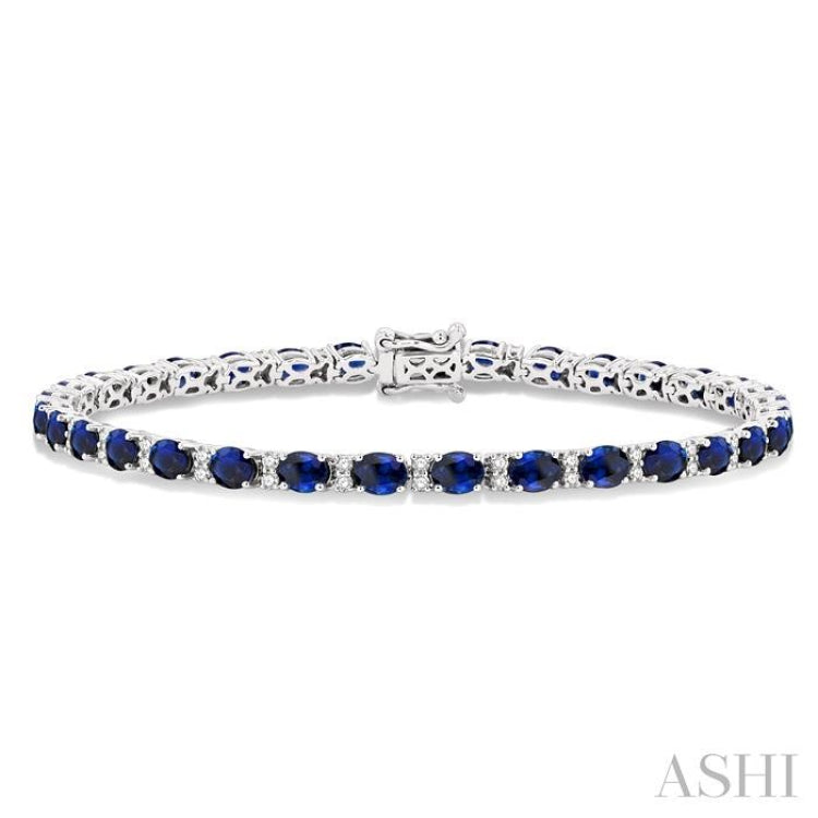 4x3 MM Oval Cut Sapphire and 5/8 Ctw Round Cut Diamond Precious Bracelet in 14K White Gold