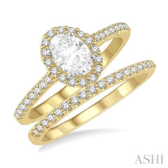 1/2 Ctw Diamond Wedding Set With 3/8 Ct Oval Cut Engagement Ring and 1/10 Ct Wedding Band in 14K Yellow and white gold
