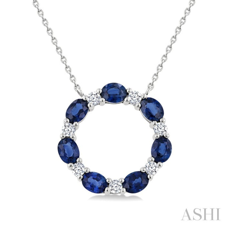 4x3 MM Oval Cut Sapphire and 1/4 Ctw Round Cut Diamond Circle Pendant With Chain in 14K White Gold