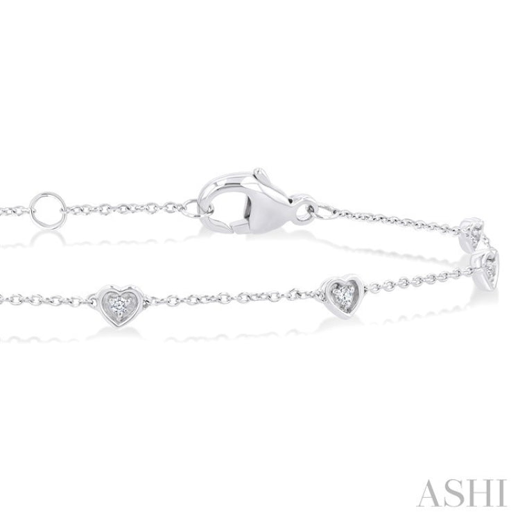 1/10 Ctw Petite Heart Round Cut Diamond Station Bracelet in 10K White Gold