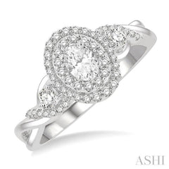 5/8 Ctw Split Twisted Shank Round Cut Diamond Engagement Ring With 1/4 Ct Oval Cut Center Stone in 14K White Gold