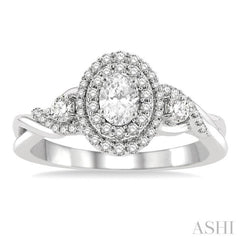 5/8 Ctw Split Twisted Shank Round Cut Diamond Engagement Ring With 1/4 Ct Oval Cut Center Stone in 14K White Gold