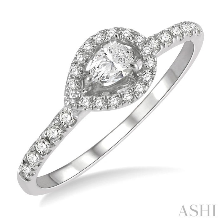1/4 Ctw Round and Pear Cut Diamond Petite Fashion Ring in 10K White Gold