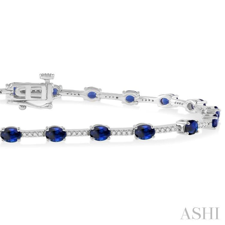 4x3 MM Oval Cut Sapphire and 1/3 Ctw Round Cut Diamond Precious Bracelet in 10K White Gold