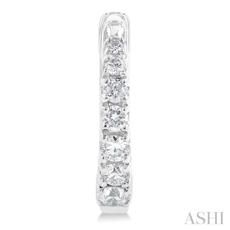 1/4 Ctw Graduated Round Cut Diamond Fashion Huggie Petites in 10K White Gold