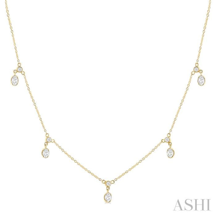 5/8 Ctw Dangle Oval and Round Cut Diamond Station Necklace in 14K Yellow Gold