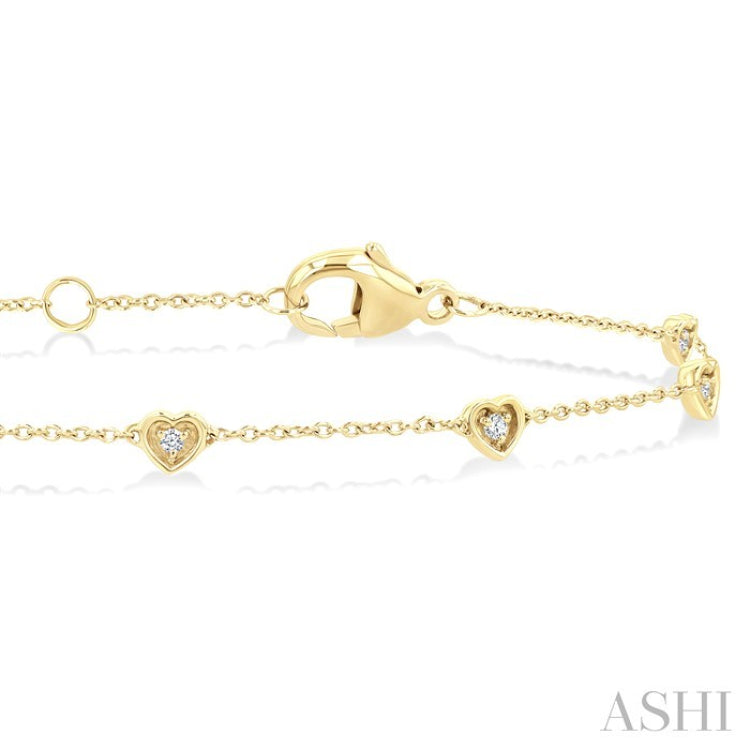 1/10 Ctw Petite Heart Round Cut Diamond Station Bracelet in 10K Yellow Gold