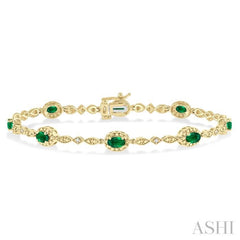 5x3 MM Oval Cut Emerald and 1/20 Ctw Round Cut Diamond Bracelet in 10K Yellow Gold