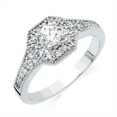 14K White Gold Engagement Ring With .24ct Of Round Diamond Melee And A 1/3ct Round Center Diamond.